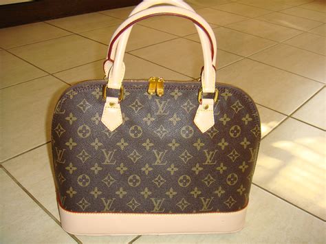 geanta louis vuitton fake|false louis vuitton lv.